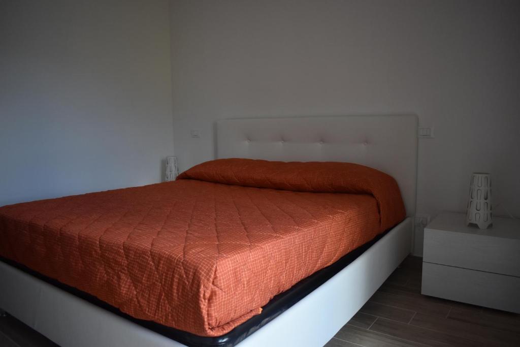 Postel nebo postele na pokoji v ubytování Da Clara e Raffaele