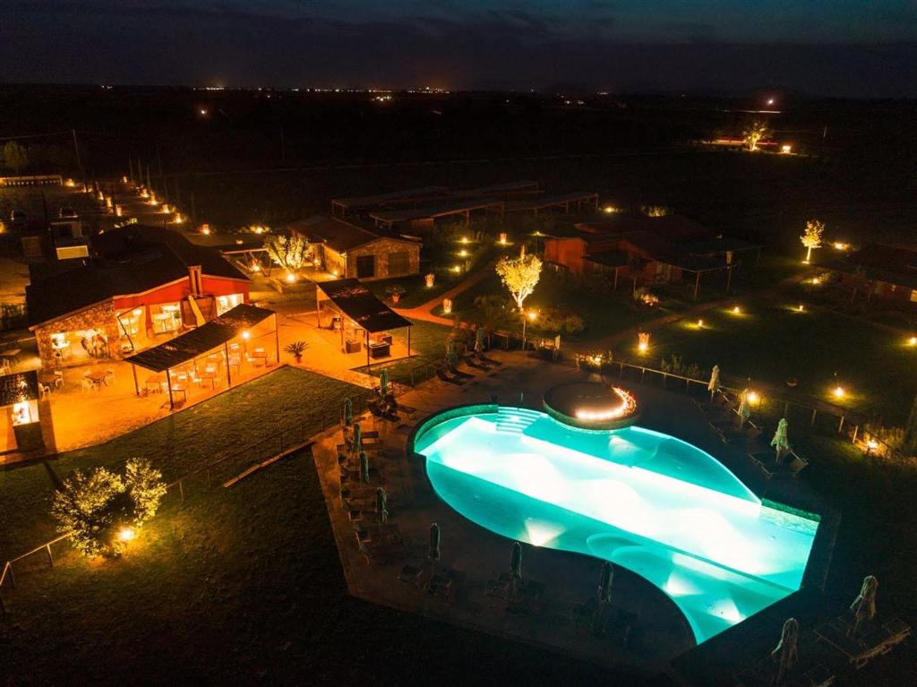 Bazén v ubytovaní Podere Maremma Spa & Ristorante alebo v jeho blízkosti