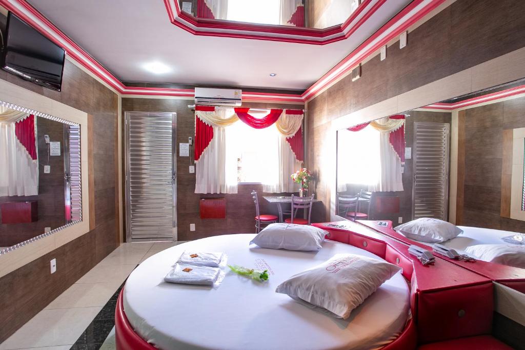 Giường trong phòng chung tại Motel Desejo