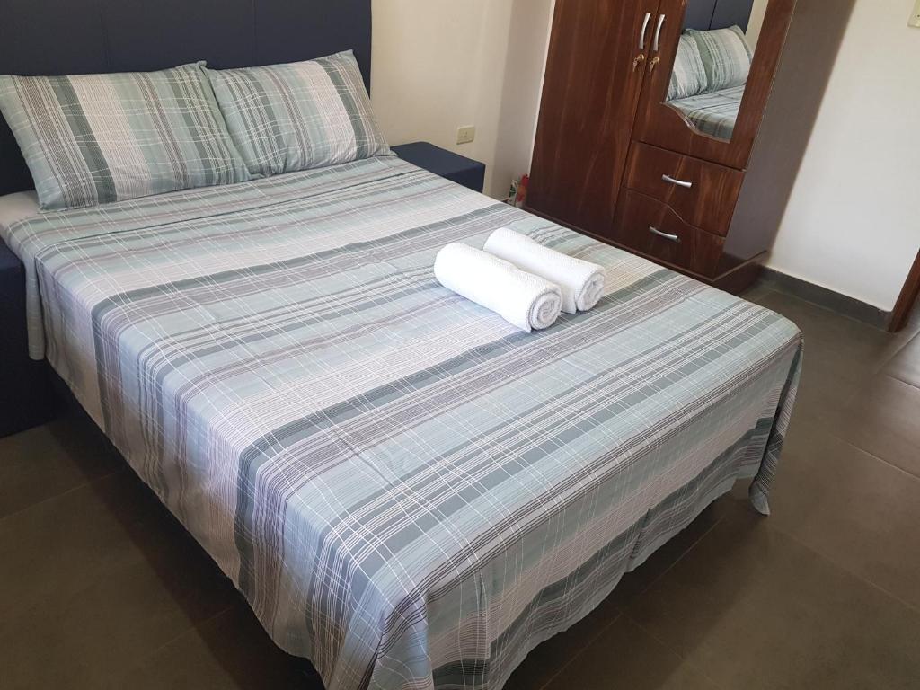 Postel nebo postele na pokoji v ubytování Casa Naranja