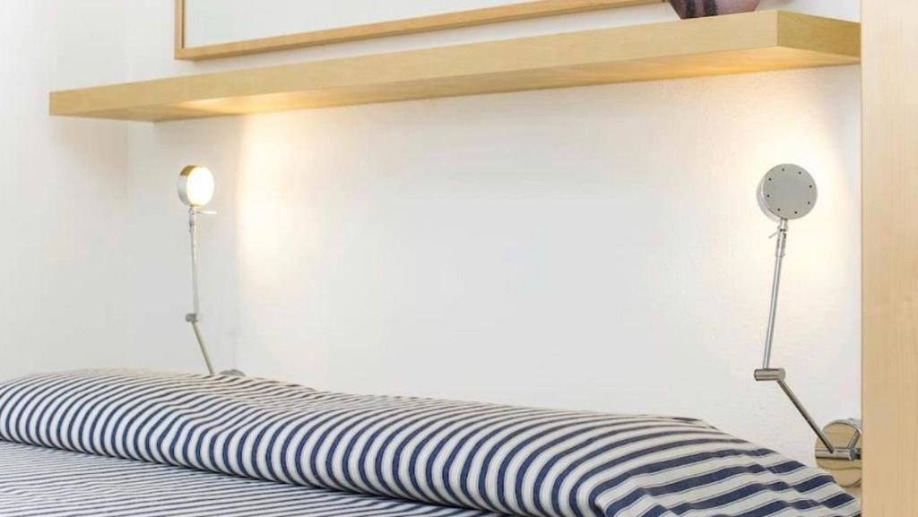 Postel nebo postele na pokoji v ubytování Carloforte Bellavista