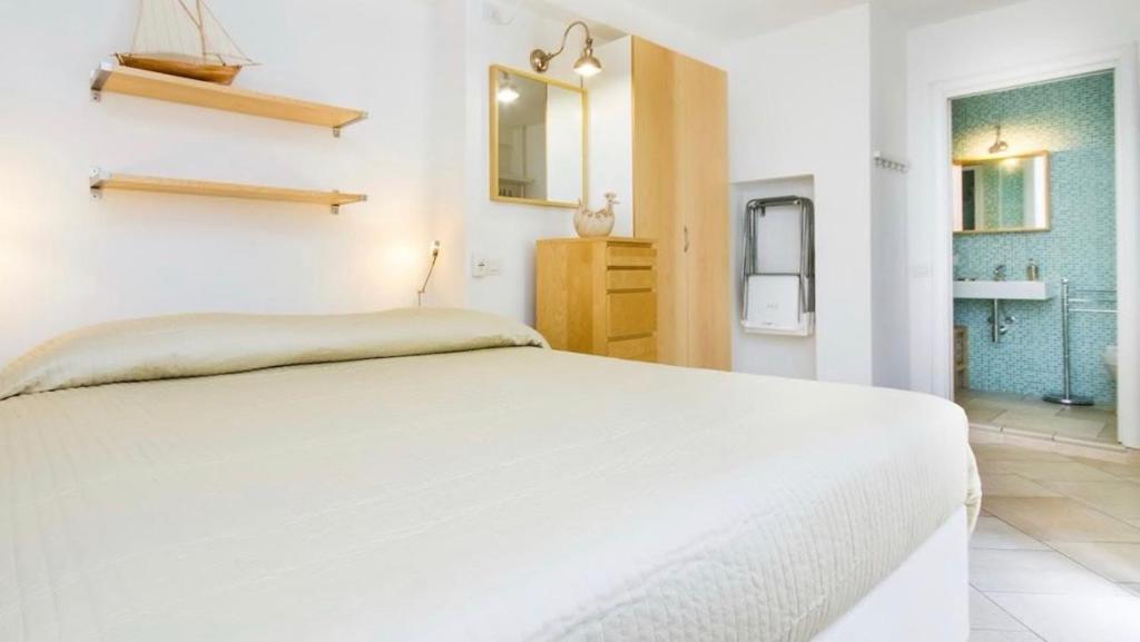Postel nebo postele na pokoji v ubytování Carloforte Bellavista