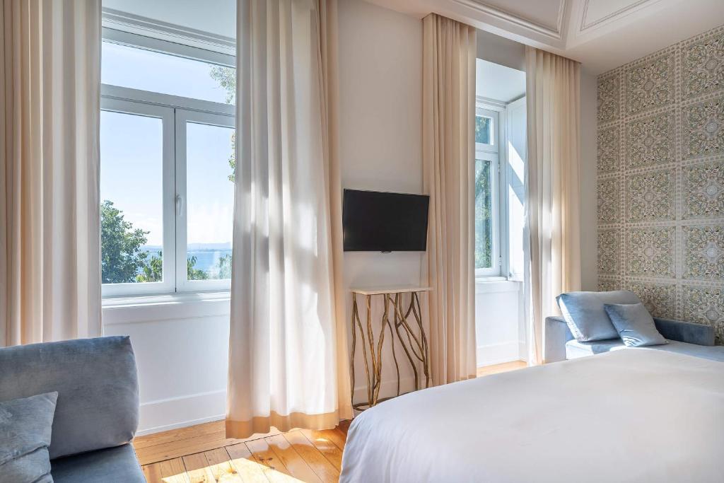 Postel nebo postele na pokoji v ubytování Santiago de Alfama - Boutique Hotel