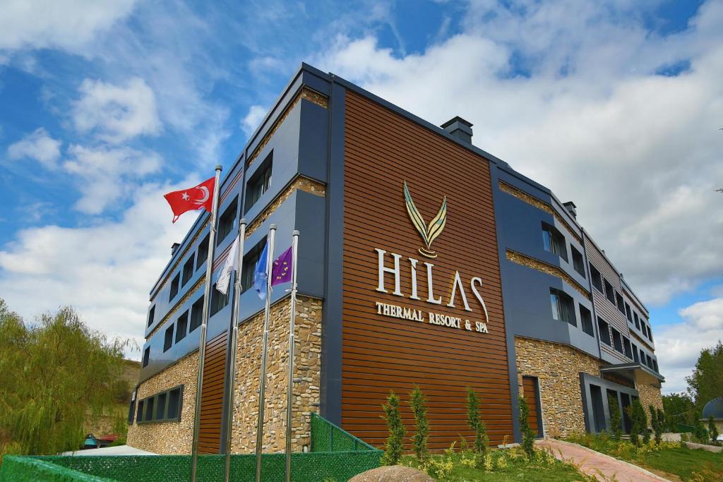 a building with the name of a hotel at Hilas Thermal Resort Spa & Aqua in Kayacık