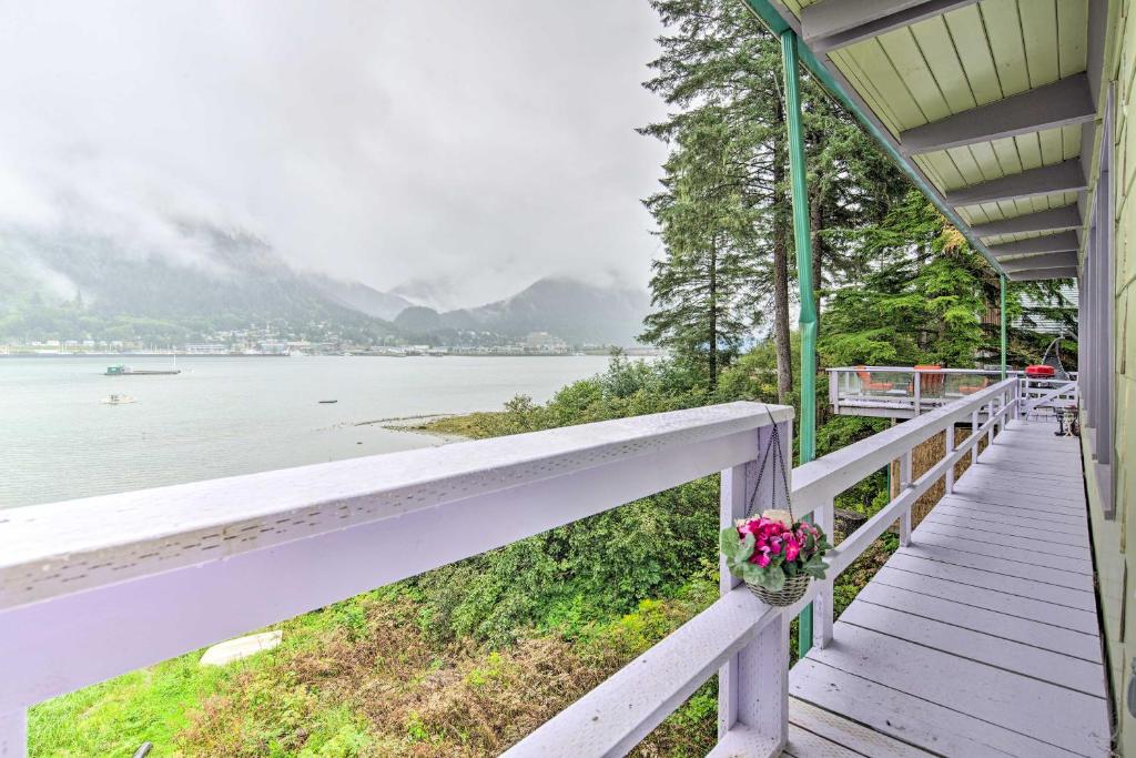 a porch of a house with a view of the water at Waterfront House with Glacial Views - Near Downtown! in Juneau