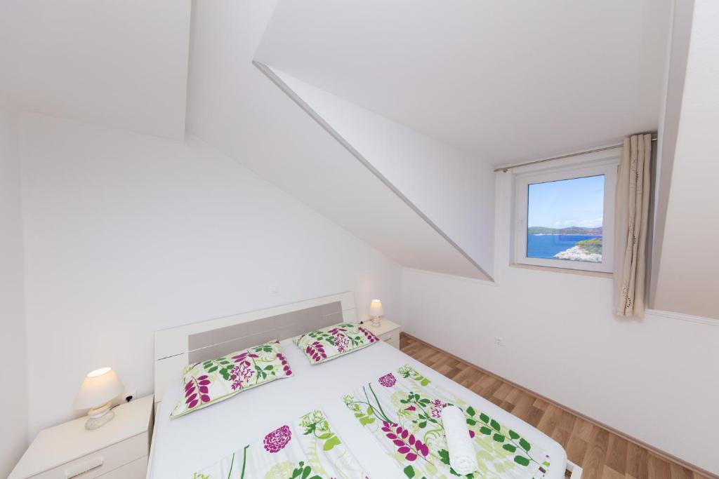 Posteľ alebo postele v izbe v ubytovaní Apartment Ela