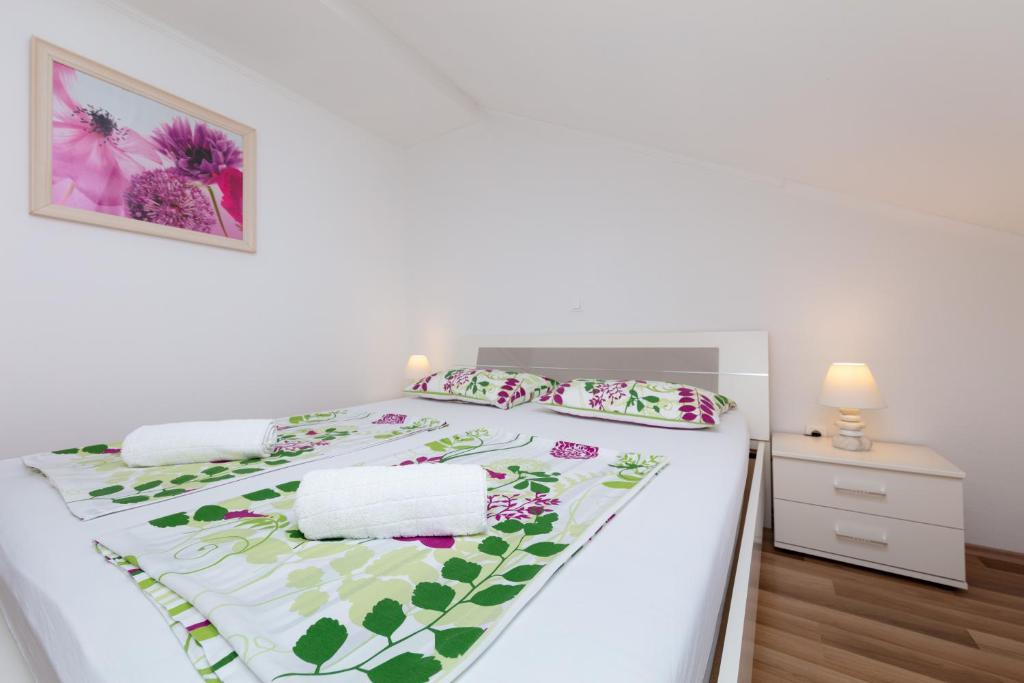 Posteľ alebo postele v izbe v ubytovaní Apartment Ela
