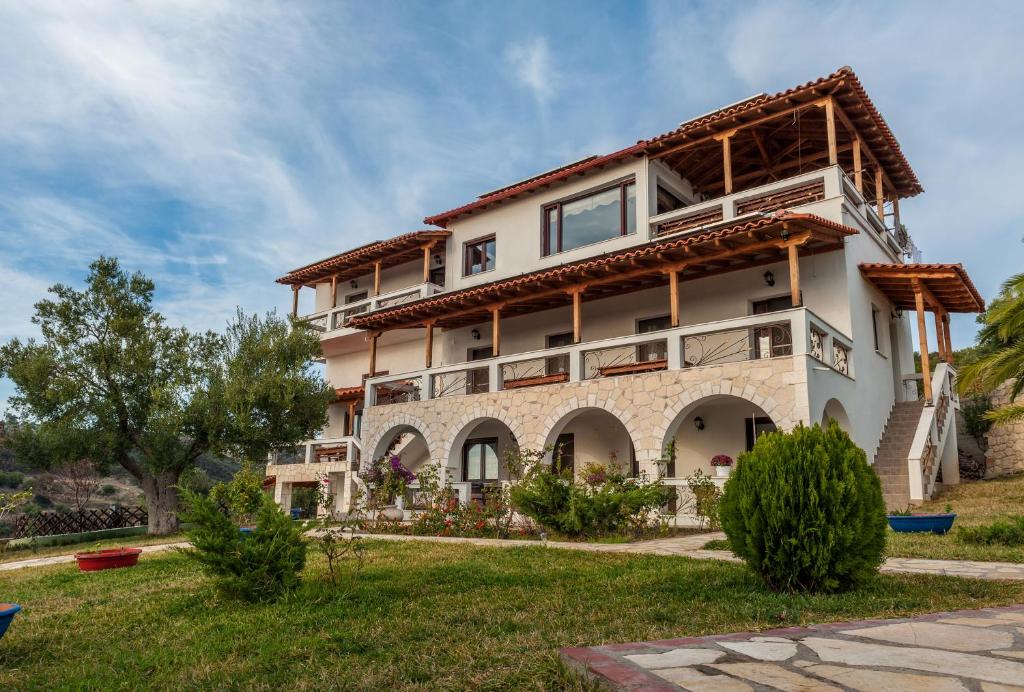 a villa with a view of the house at Blue Fox in Nea Skioni