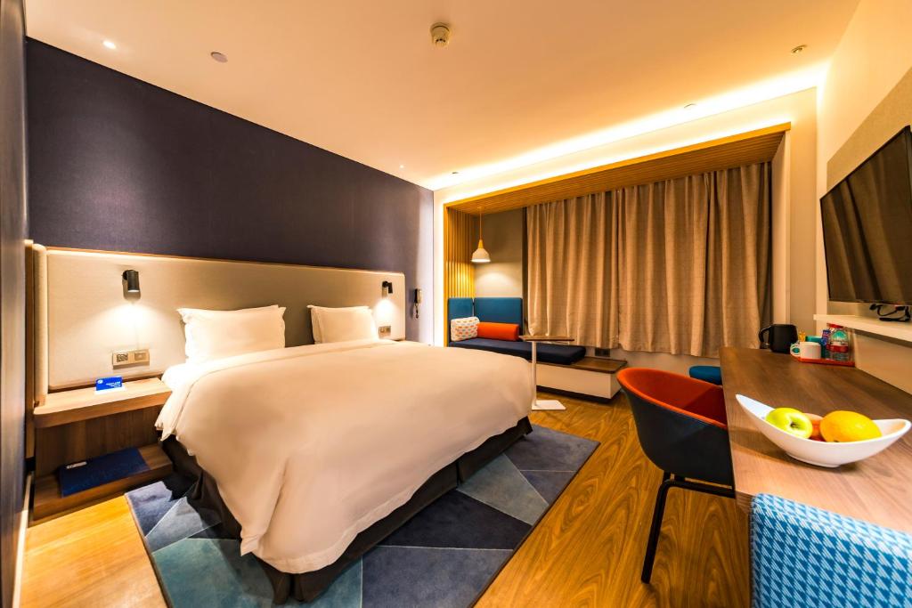 Postel nebo postele na pokoji v ubytování Holiday Inn Express Shijiazhuang High-tech Zone by IHG