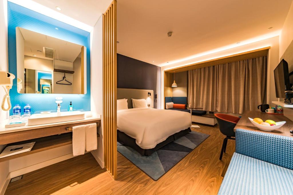 Postel nebo postele na pokoji v ubytování Holiday Inn Express Shijiazhuang High-tech Zone by IHG