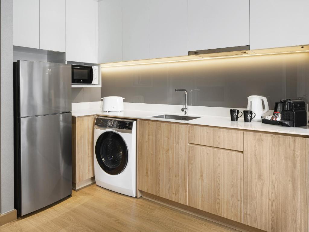 Kuchyň nebo kuchyňský kout v ubytování Oakwood Suites Bangkok