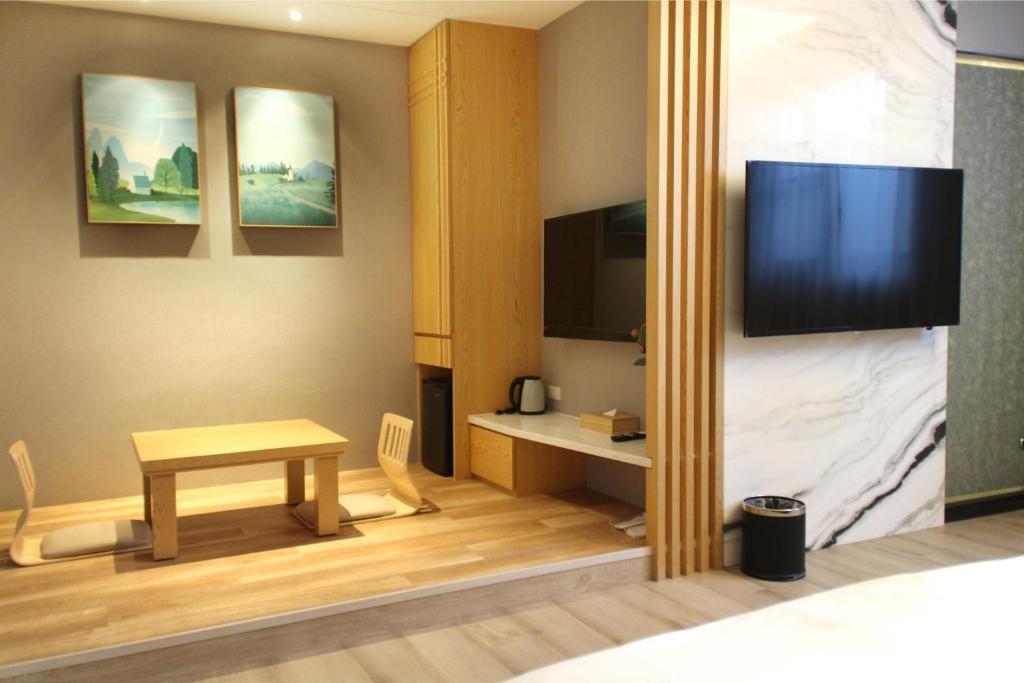 TV a/nebo společenská místnost v ubytování Gamalan FL Spring Hotel