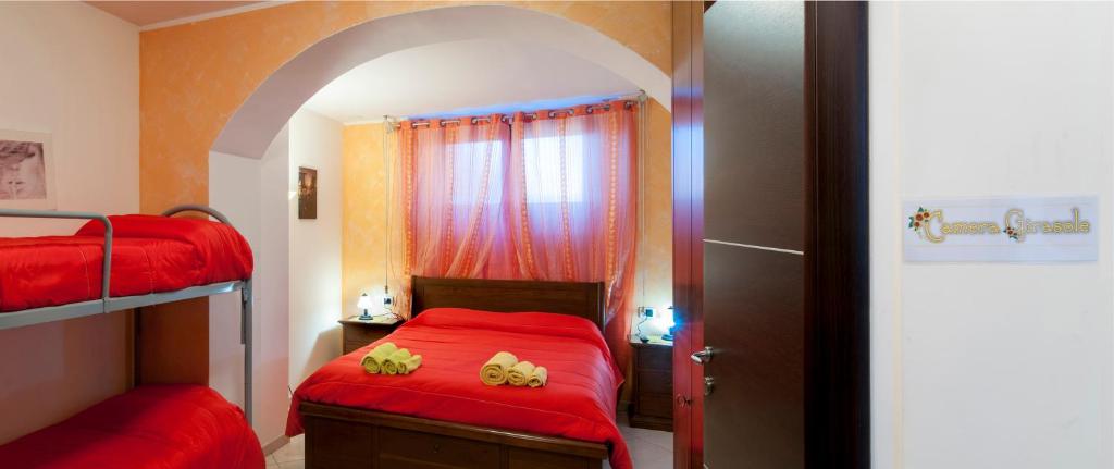 Łóżko lub łóżka w pokoju w obiekcie B&B Bovianum