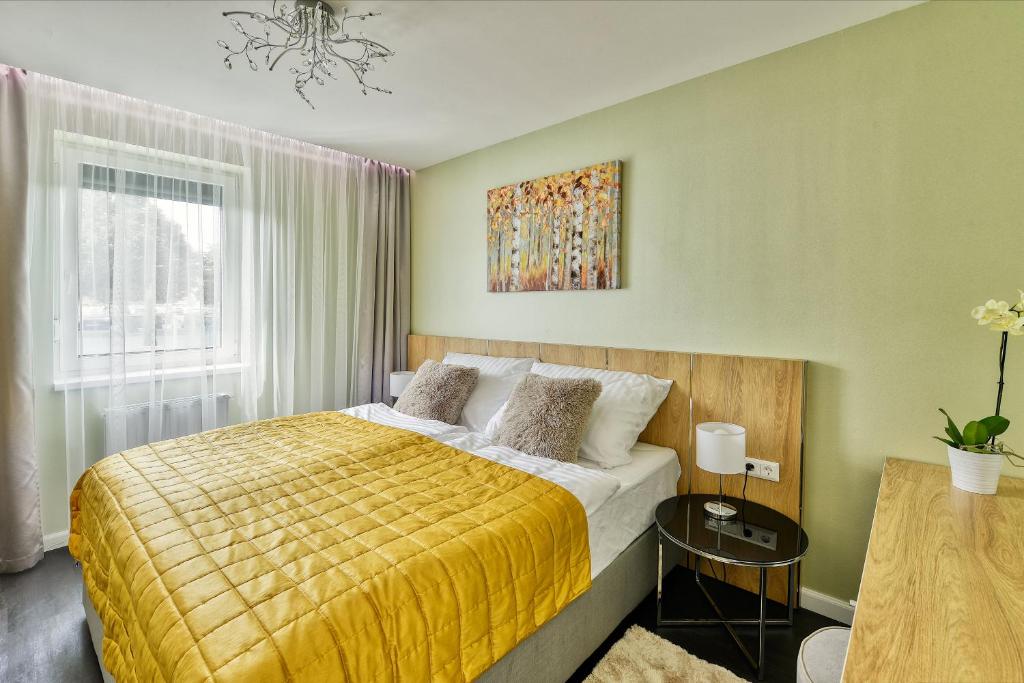 Posteľ alebo postele v izbe v ubytovaní Club Luxury Apartman