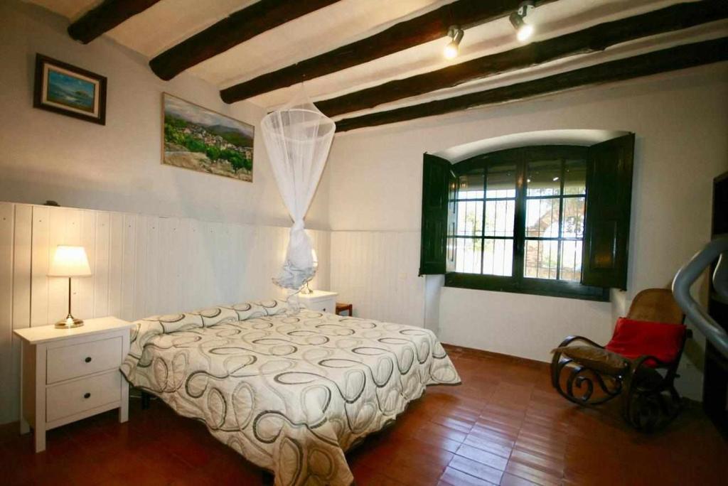 Postel nebo postele na pokoji v ubytování Casa rural alquiler íntegro Cal Sisco
