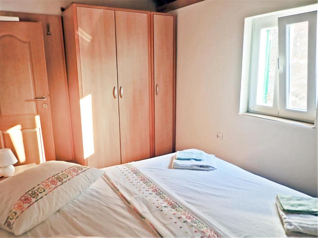 Posteľ alebo postele v izbe v ubytovaní Mareta - Apartment in a stone house