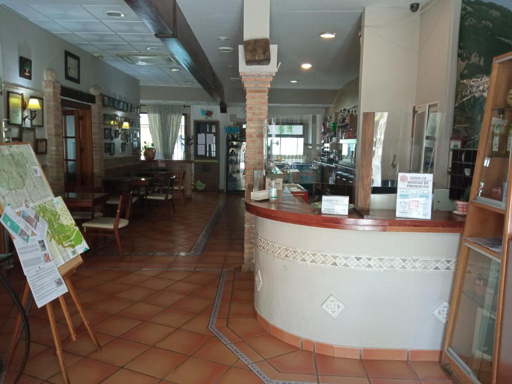 Un restaurante o sitio para comer en Hotel Rural Puerto Mágina