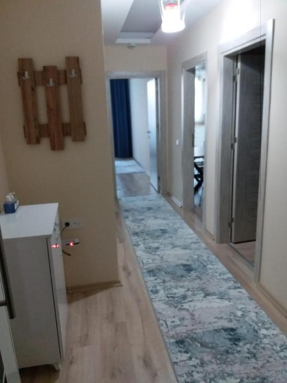Postel nebo postele na pokoji v ubytování Çınar Residance