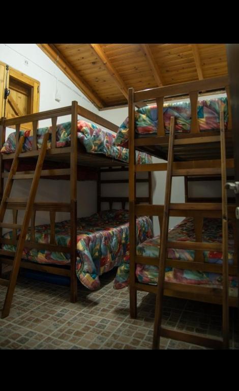 Palanda nebo palandy na pokoji v ubytování Aretis sea view house