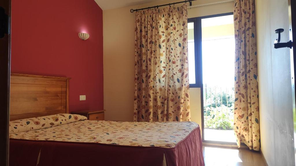 Cama o camas de una habitación en Hotel Rural Puerto Mágina