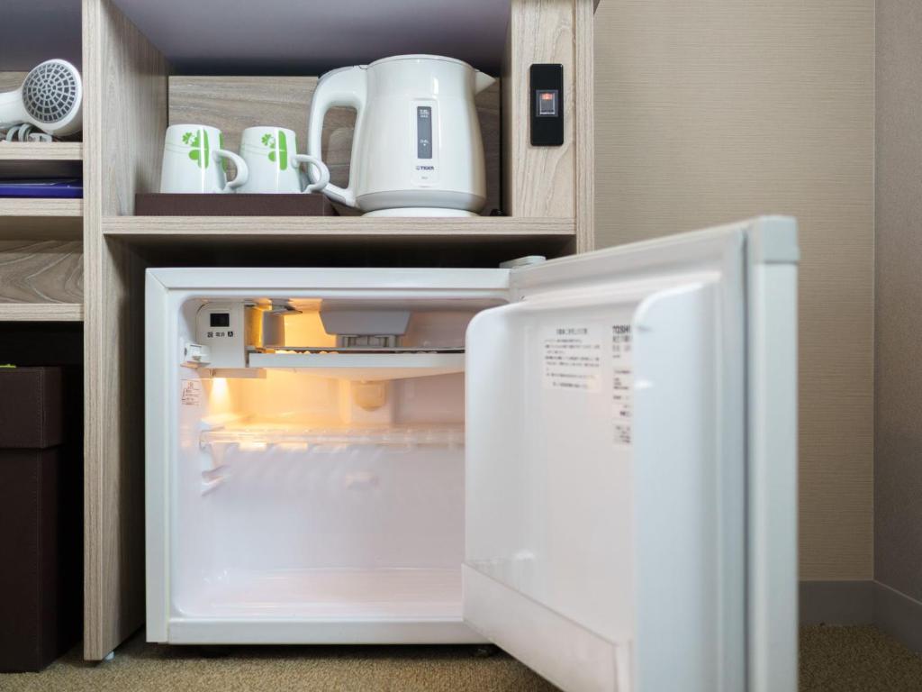 Kuchyň nebo kuchyňský kout v ubytování Super Hotel Shinagawa Aomono-Yokocho