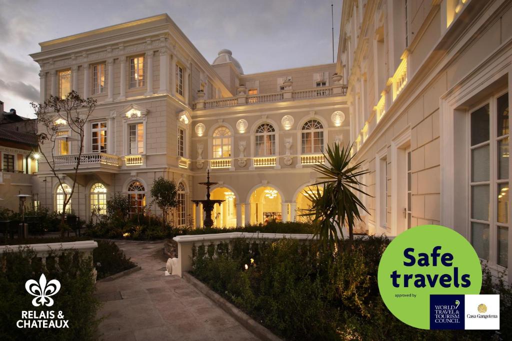 a large building with a sign that says sale travels at Hotel Casa Gangotena in Quito