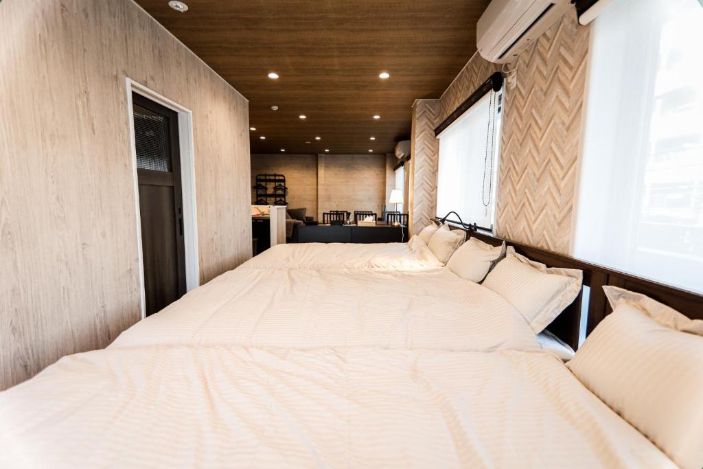 two beds in the back of a trailer at LEO Nisen Gobankan - Vacation STAY 93056 in Funabashi