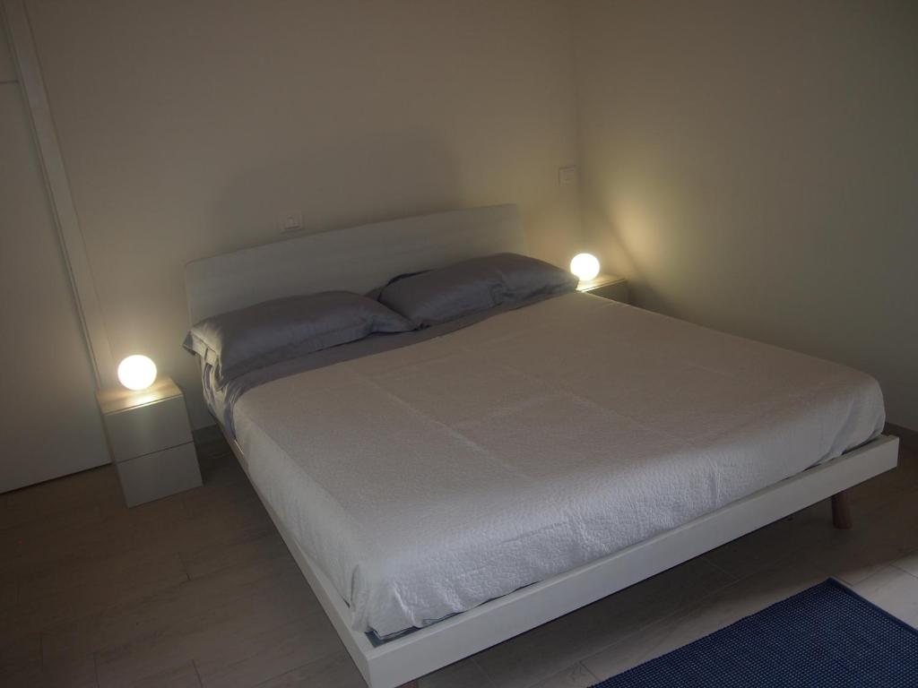 Postel nebo postele na pokoji v ubytování Agriturismo Ardizio 43