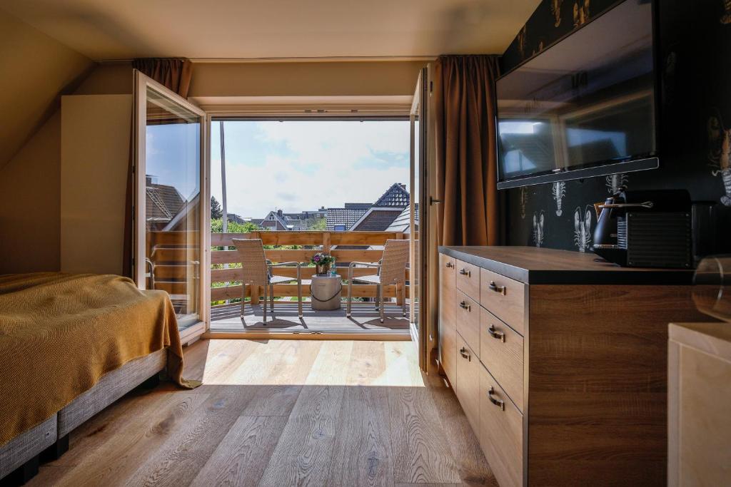 Kuchyň nebo kuchyňský kout v ubytování Landhaus Sylter Hahn