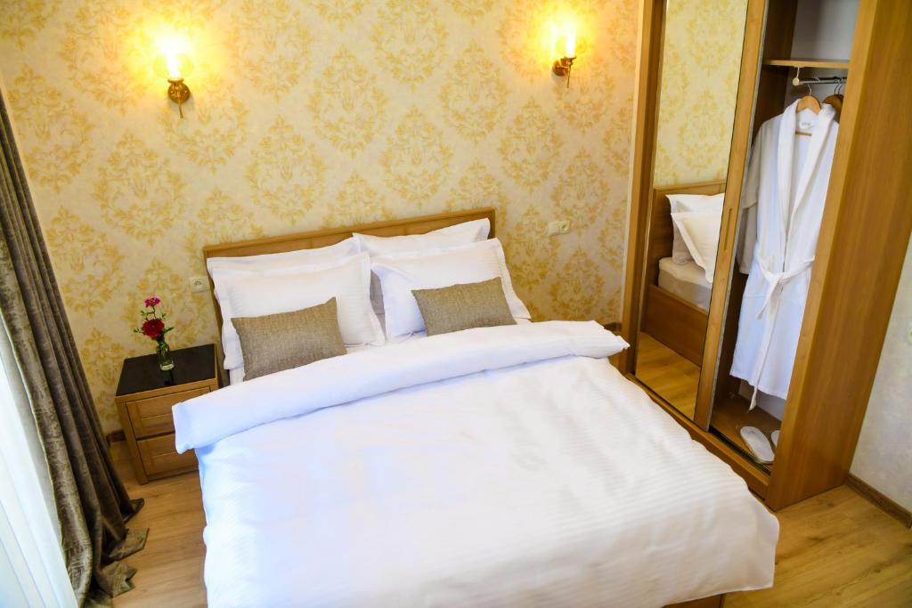 Postel nebo postele na pokoji v ubytování Hotel Late