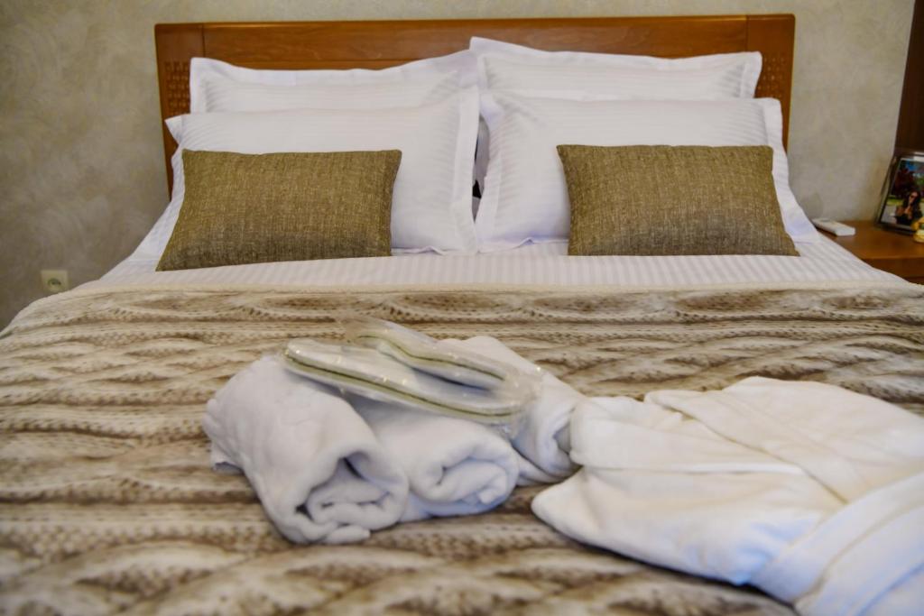 Postel nebo postele na pokoji v ubytování Hotel Late