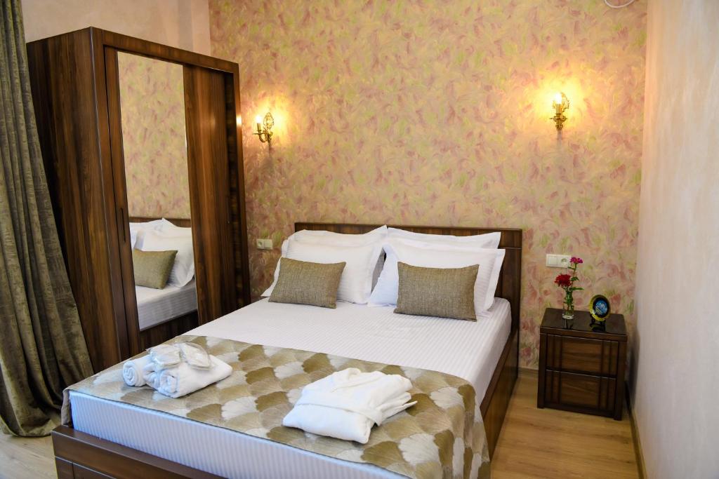 Postel nebo postele na pokoji v ubytování Hotel Late