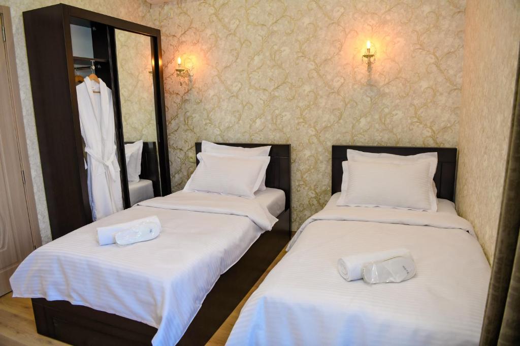 Postel nebo postele na pokoji v ubytování Hotel Late