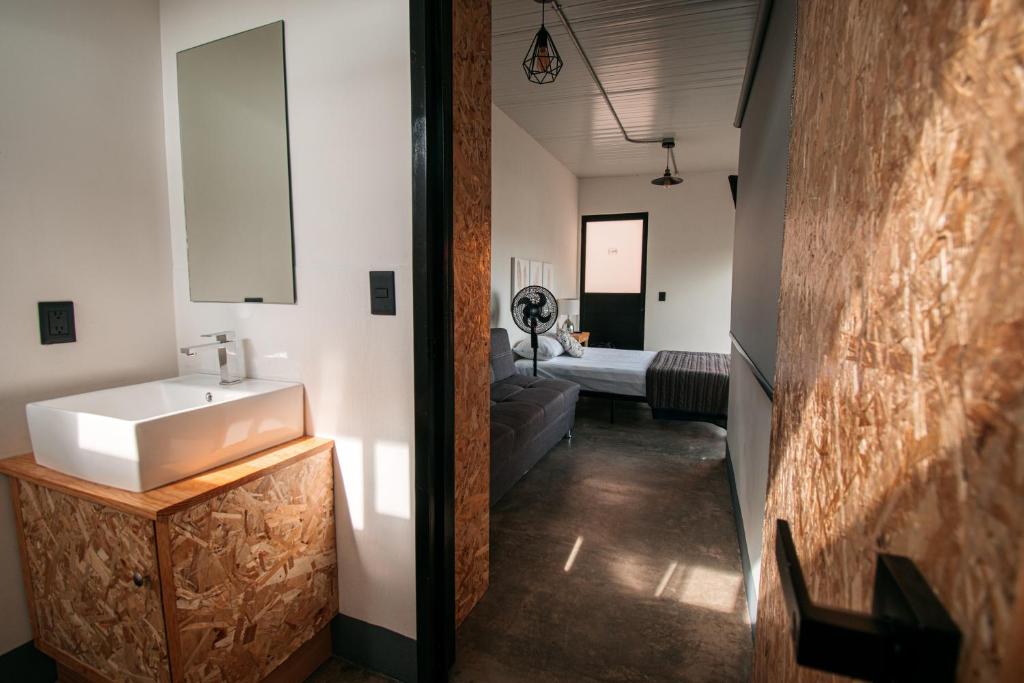 Postel nebo postele na pokoji v ubytování Hostal Hidalgo