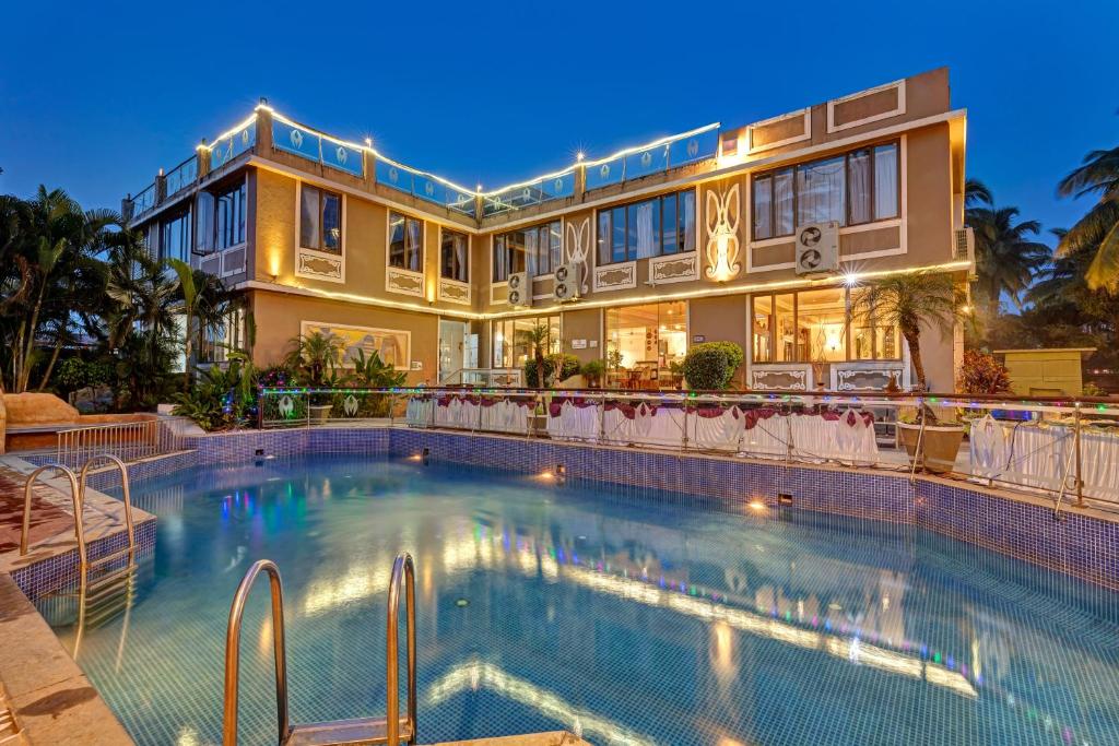 Bazén v ubytování Club Mahindra Acacia Palms nebo v jeho okolí