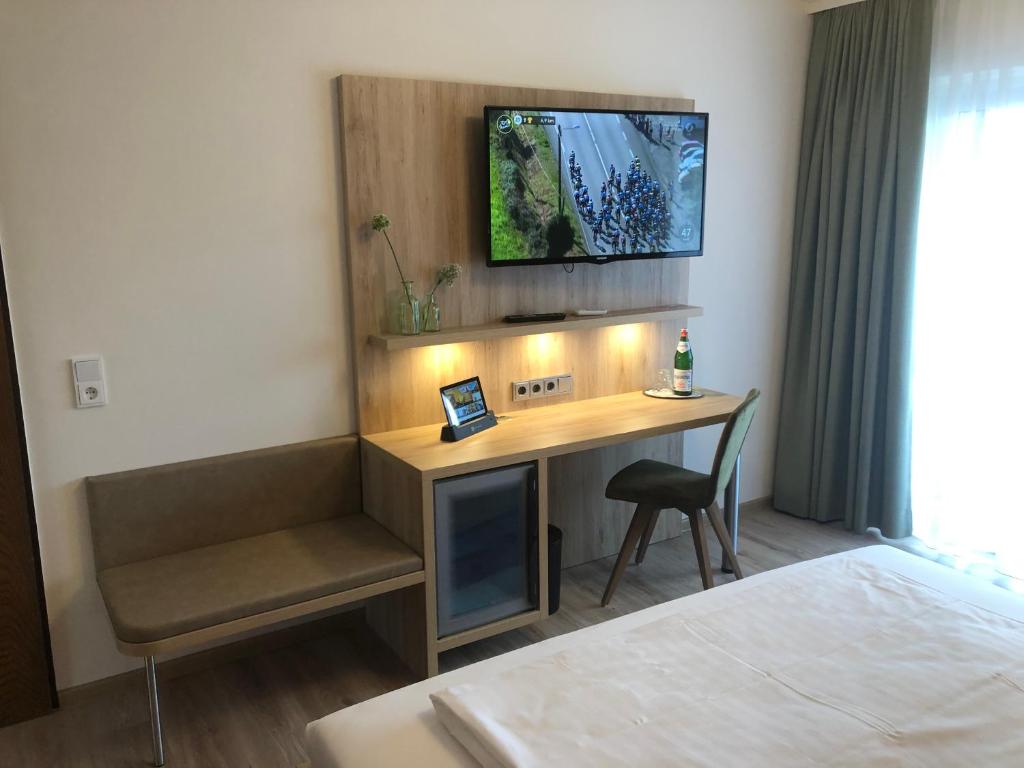 Postel nebo postele na pokoji v ubytování Hotel Wilms