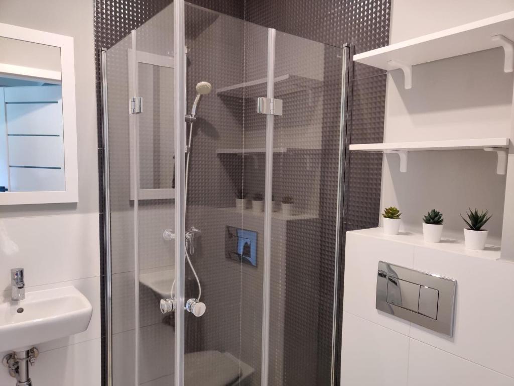 Kúpeľňa v ubytovaní Ostrowo Plaza