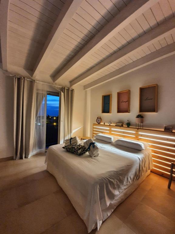 Posteľ alebo postele v izbe v ubytovaní LA TERRAZZA DI PUGLIA