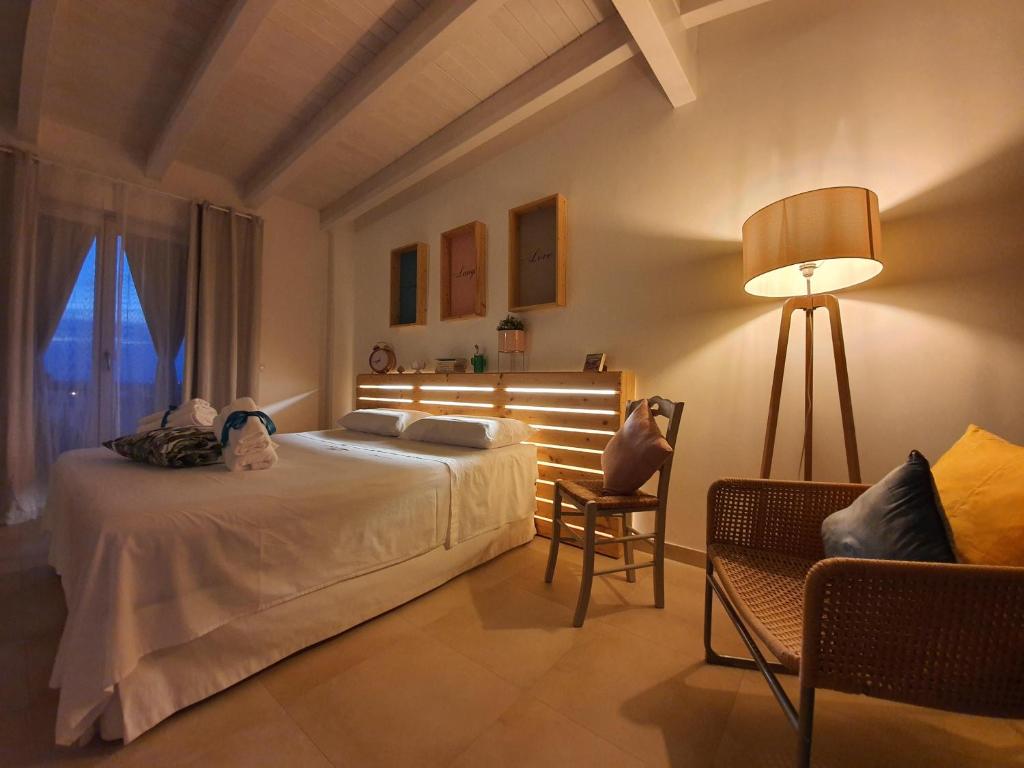 Posteľ alebo postele v izbe v ubytovaní LA TERRAZZA DI PUGLIA
