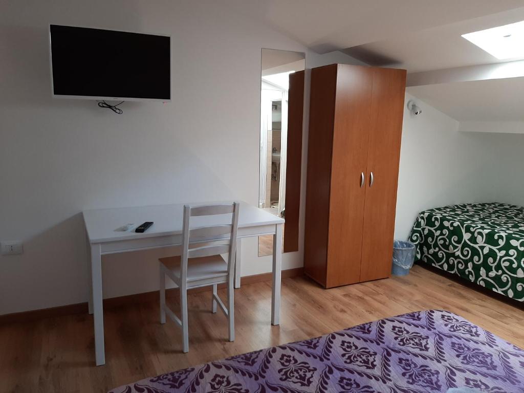 Postel nebo postele na pokoji v ubytování Sabbia del Sud Affittacamere
