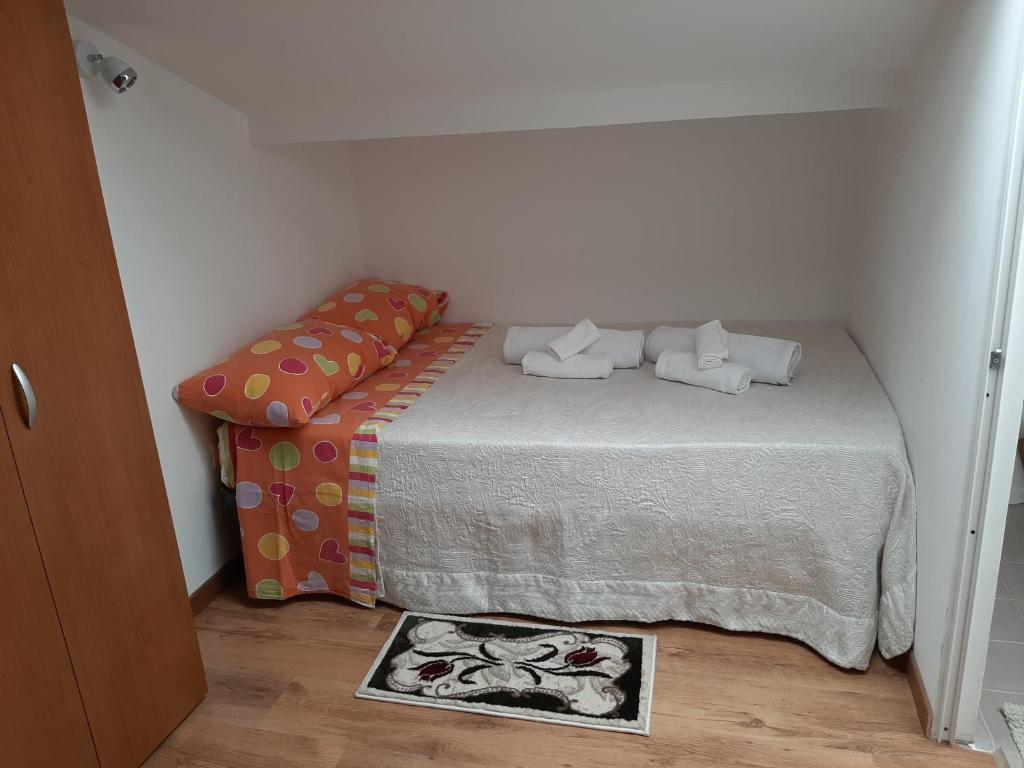 Postel nebo postele na pokoji v ubytování Sabbia del Sud Affittacamere