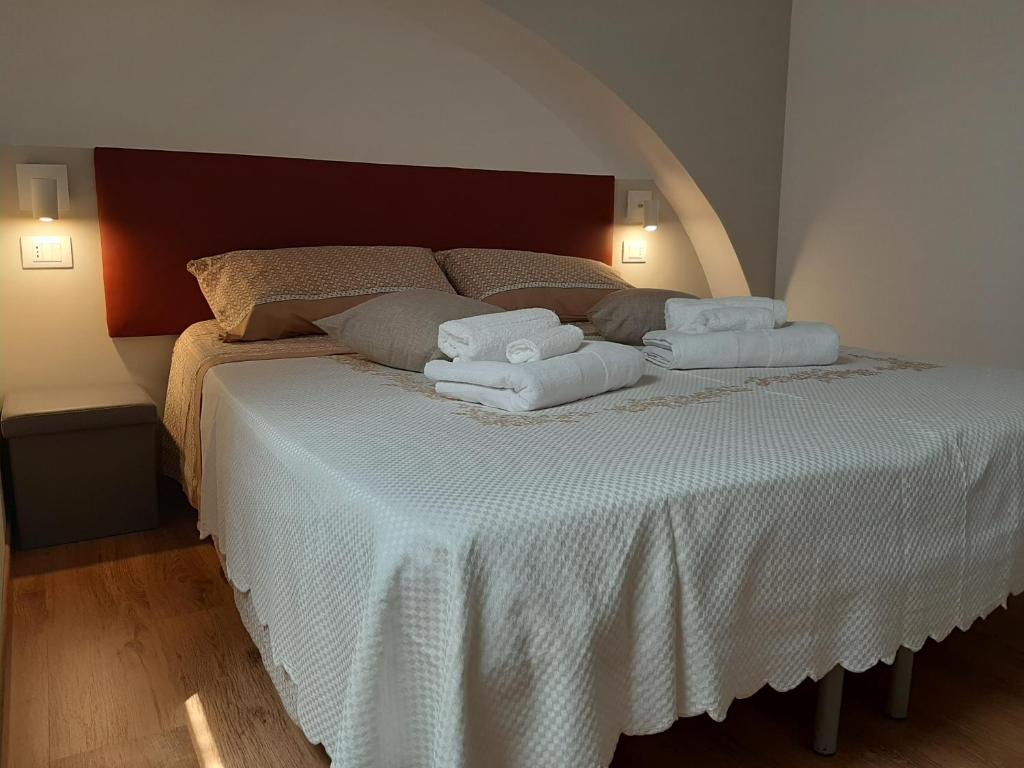 Postel nebo postele na pokoji v ubytování Sabbia del Sud Affittacamere