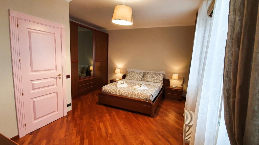 Postel nebo postele na pokoji v ubytování Casa De Amicis 18