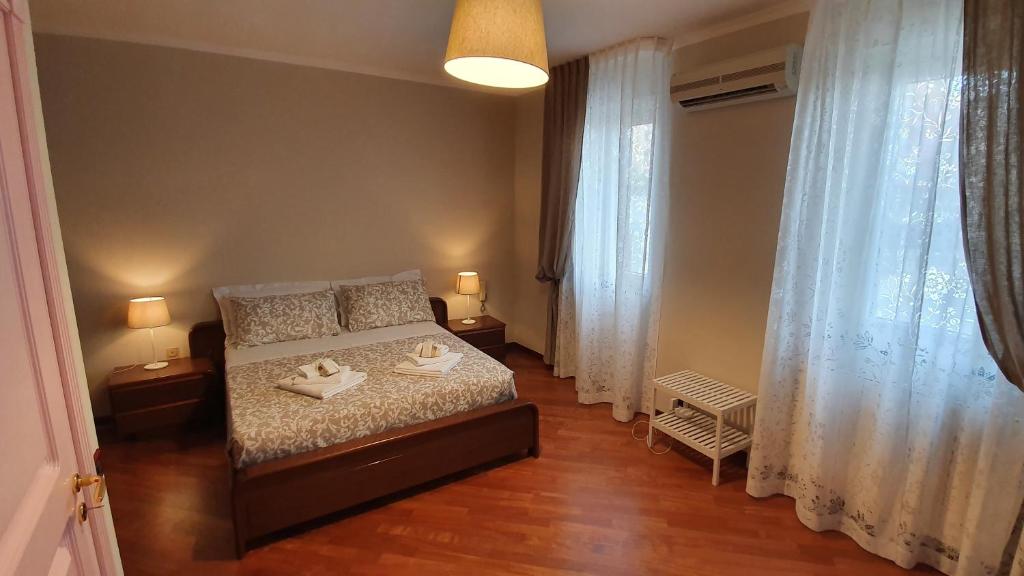 Postel nebo postele na pokoji v ubytování Casa De Amicis 18