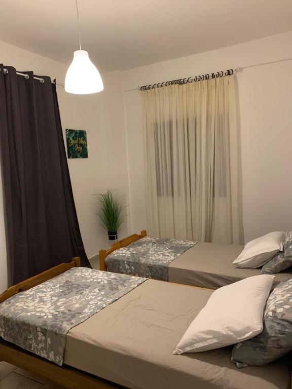 Łóżko lub łóżka w pokoju w obiekcie Lucas Lux Flogita apartment