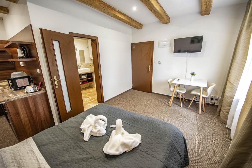 Posteľ alebo postele v izbe v ubytovaní Villa Zachar
