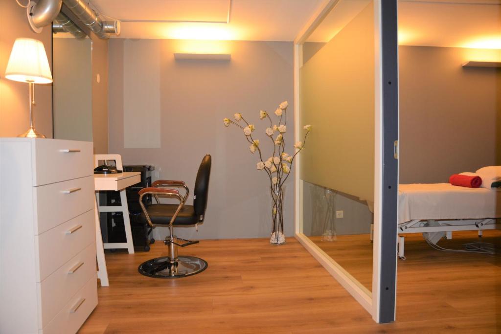 Postel nebo postele na pokoji v ubytování Hotel Emmi