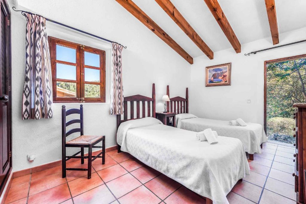 Postel nebo postele na pokoji v ubytování Villa Tomas