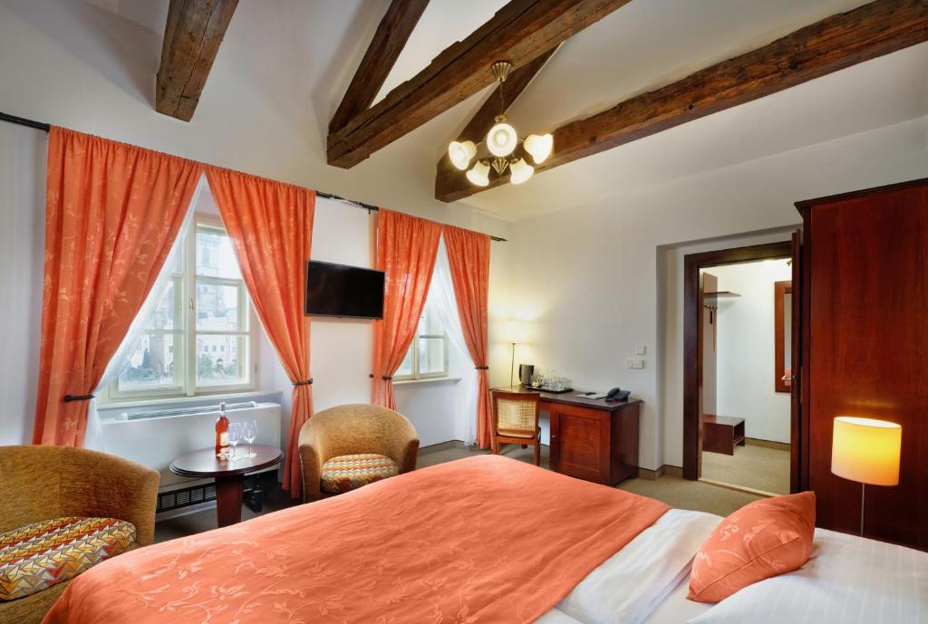 Postel nebo postele na pokoji v ubytování Hotel Lippert