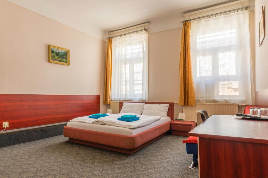 Posteľ alebo postele v izbe v ubytovaní Eitans Guesthouse